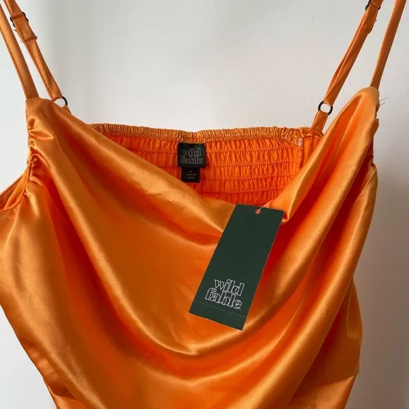 🔥Flash Sale🔥 Women's Ruched Side Bodycon Dress Wild Fable Orange
Satin Medium - Picture 10 of 10